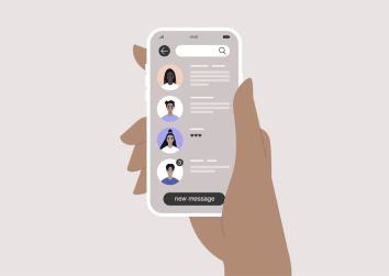 hand holding mobile phone showing direct message