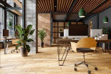 open concept office space with desk and computer
